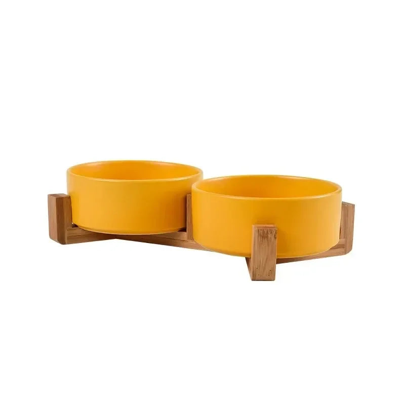 Double gamelle Chat céramique jaune dans un fond blanc