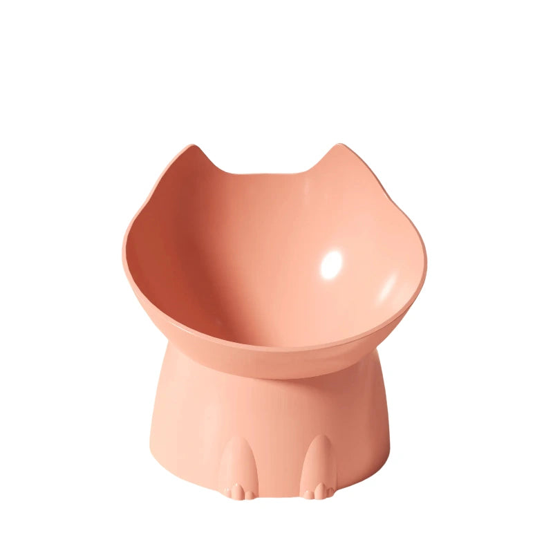 Gamelle surélevée forme chat rose sur le sol