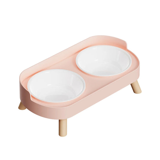 Double gamelle pour chat surélevée rose sur fond blanc